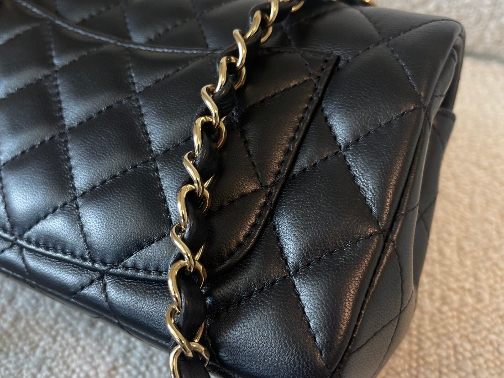 CHANEL Handbag 21K Black Lambskin Quilted Mini Rectangular Single Flap Light Gold Hardware - Redeluxe