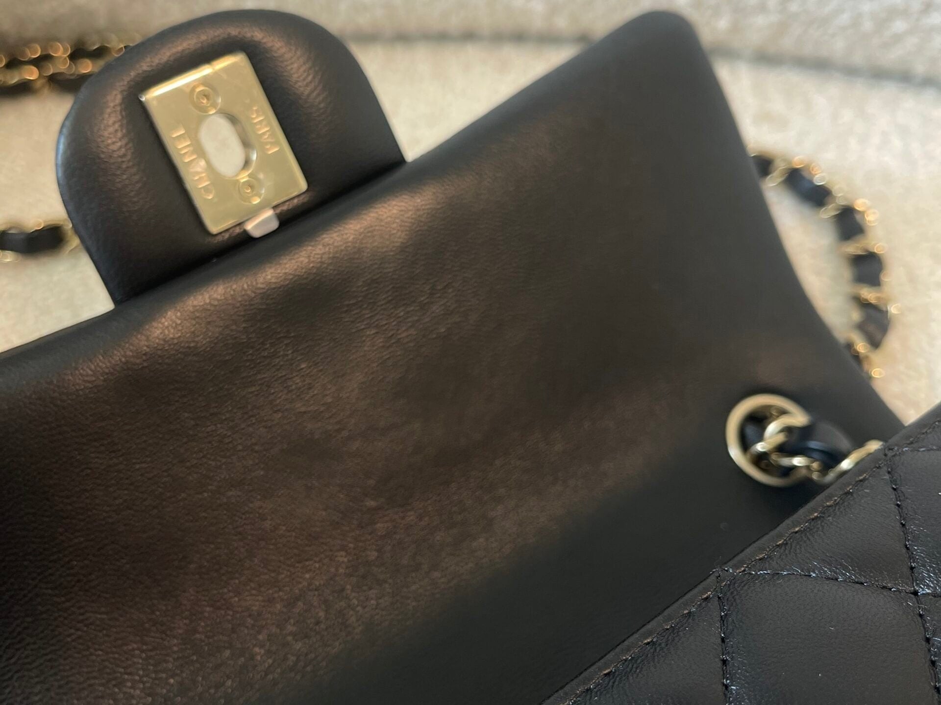 CHANEL Handbag 21K Black Lambskin Quilted Mini Rectangular Single Flap Light Gold Hardware - Redeluxe