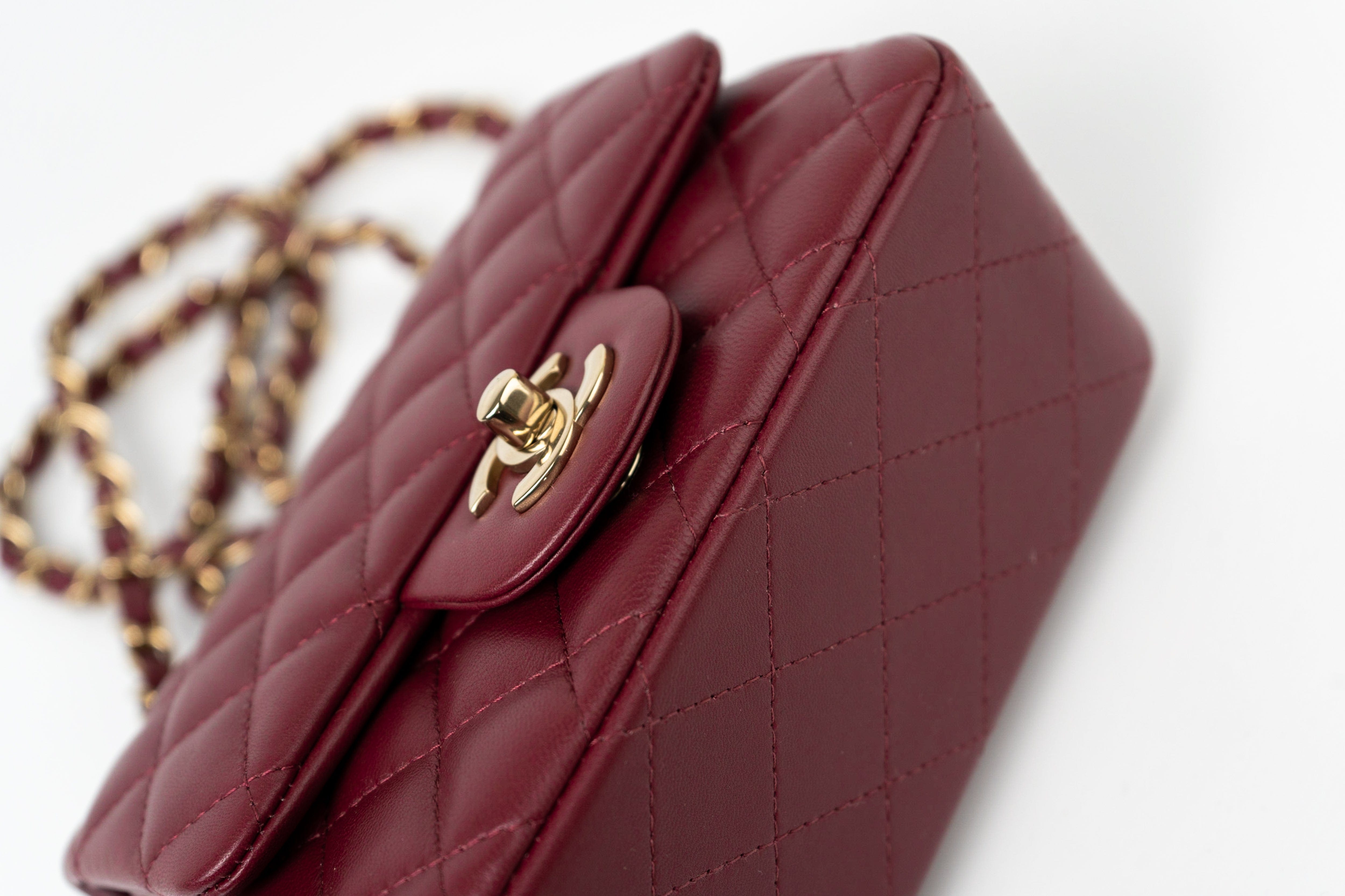 CHANEL Handbag 21K Burgundy Lambskin Quilted Mini Square Flap - Redeluxe