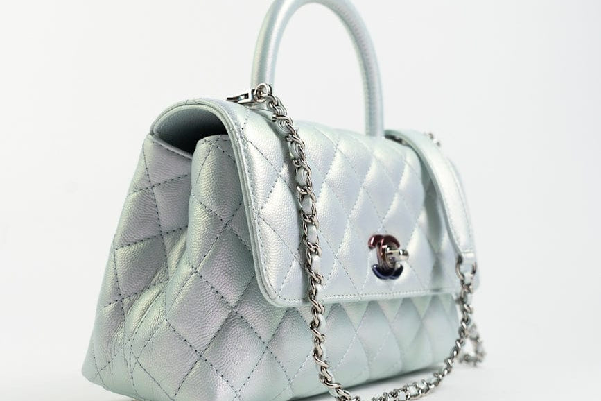 CHANEL Handbag 21K Iridescent Blue Caviar Quilted Coco Handle Small - Redeluxe
