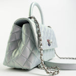 CHANEL Handbag 21K Iridescent Blue Caviar Quilted Coco Handle Small - Redeluxe