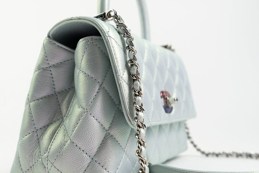 CHANEL Handbag 21K Iridescent Blue Caviar Quilted Coco Handle Small - Redeluxe