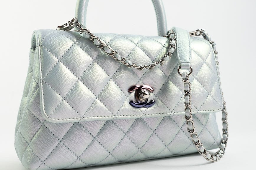CHANEL Handbag 21K Iridescent Blue Caviar Quilted Coco Handle Small - Redeluxe