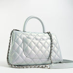 CHANEL Handbag 21K Iridescent Blue Caviar Quilted Coco Handle Small - Redeluxe
