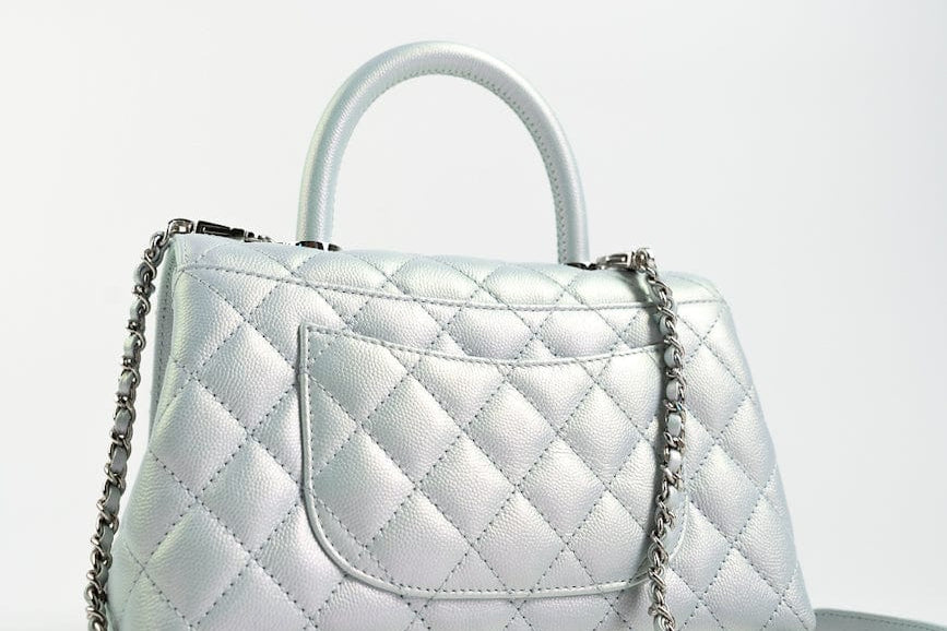 CHANEL Handbag 21K Iridescent Blue Caviar Quilted Coco Handle Small - Redeluxe