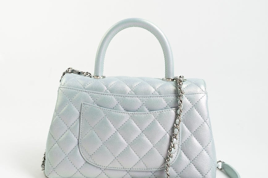 CHANEL Handbag 21K Iridescent Blue Caviar Quilted Coco Handle Small - Redeluxe