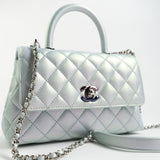 CHANEL Handbag 21K Iridescent Blue Caviar Quilted Coco Handle Small - Redeluxe