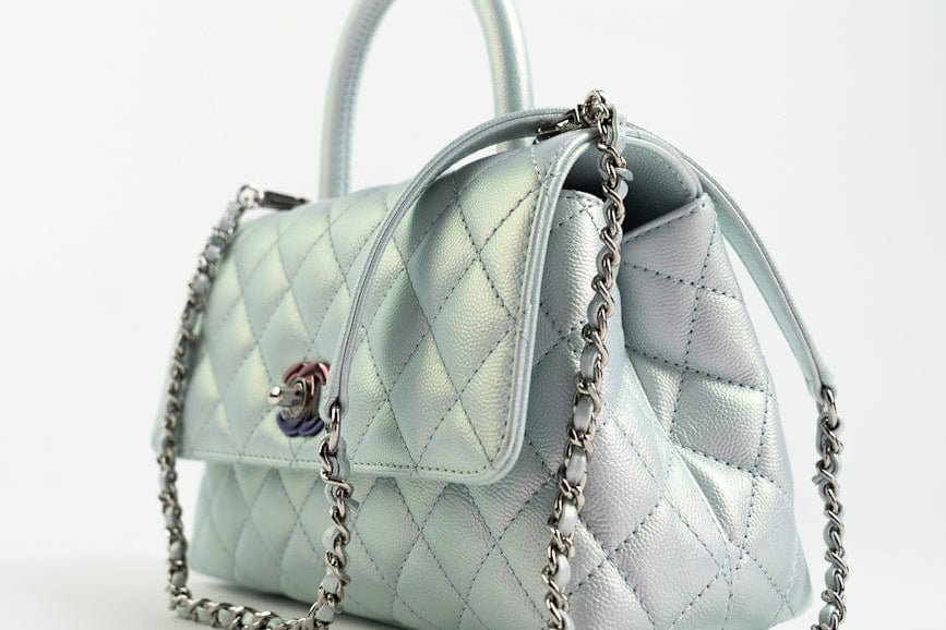 CHANEL Handbag 21K Iridescent Blue Caviar Quilted Coco Handle Small - Redeluxe