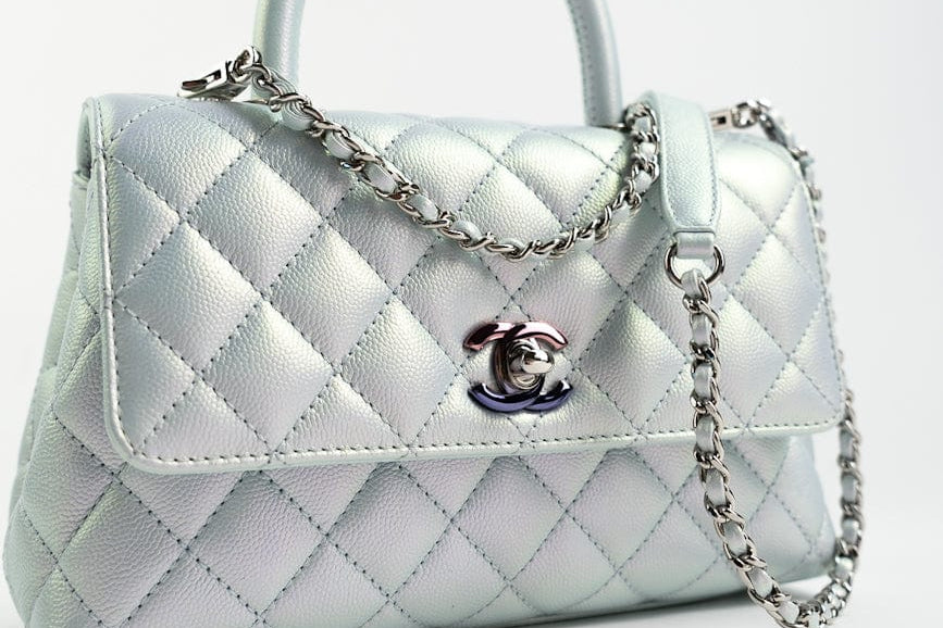 CHANEL Handbag 21K Iridescent Blue Caviar Quilted Coco Handle Small - Redeluxe
