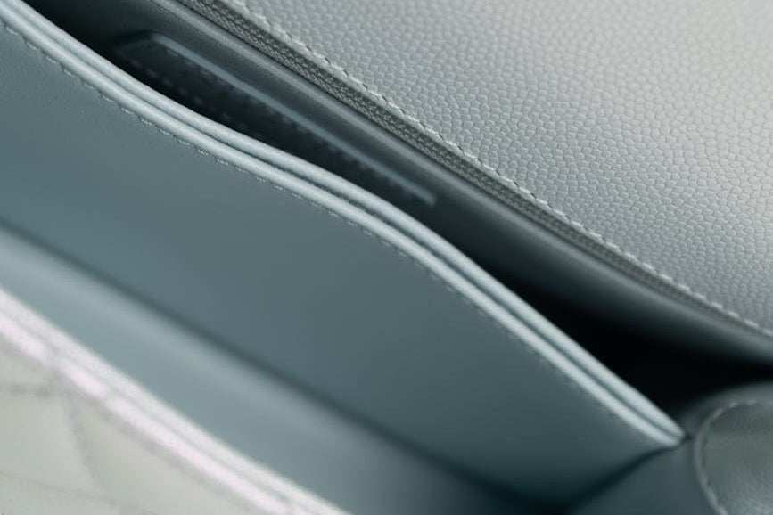 CHANEL Handbag 21K Iridescent Blue Caviar Quilted Coco Handle Small - Redeluxe