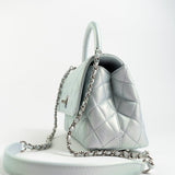 CHANEL Handbag 21K Iridescent Blue Caviar Quilted Coco Handle Small - Redeluxe