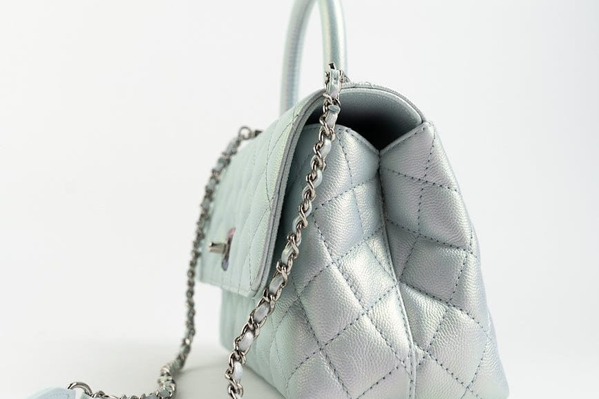 CHANEL Handbag 21K Iridescent Blue Caviar Quilted Coco Handle Small - Redeluxe