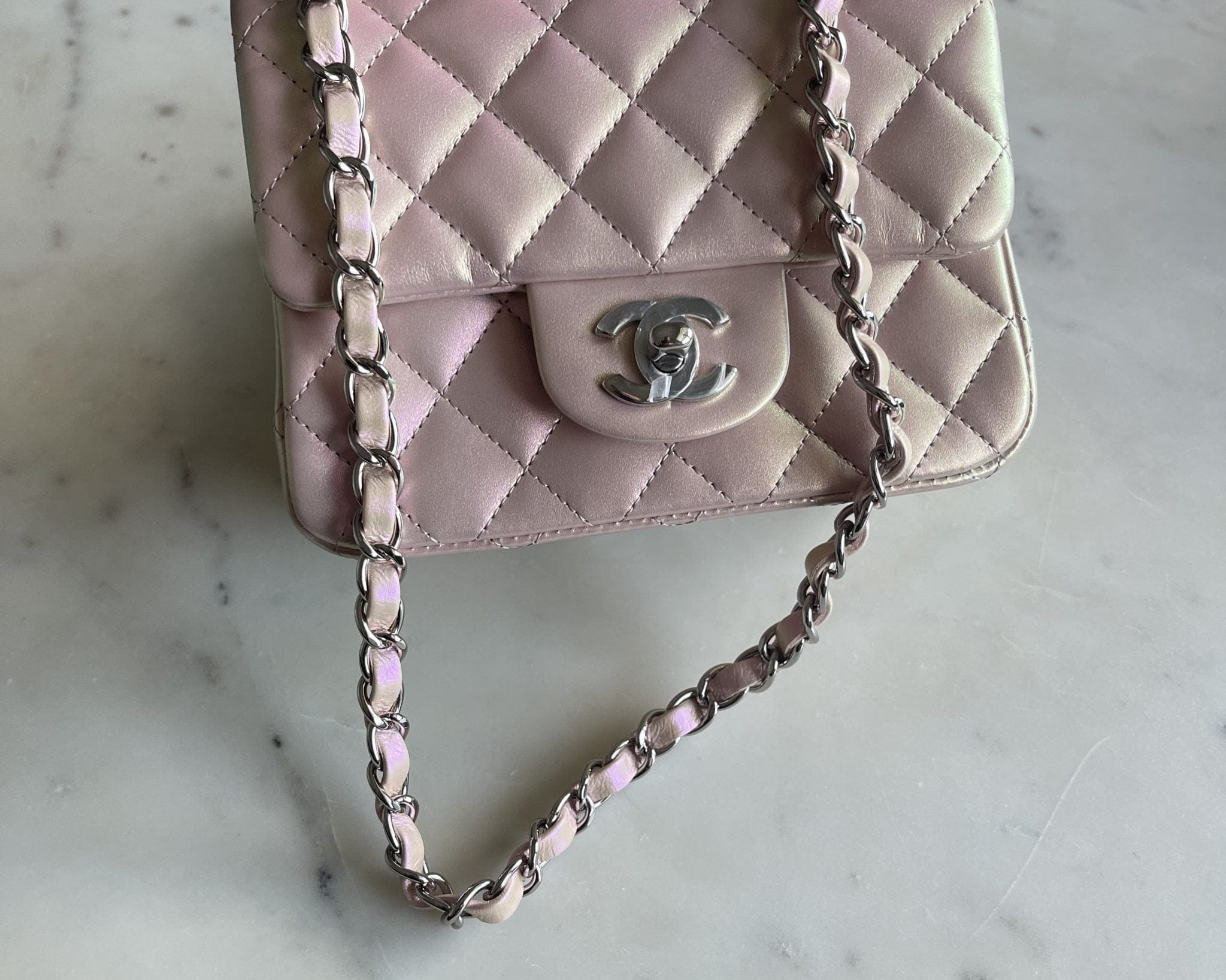 CHANEL Handbag 21K Mini Pink Iridescent Square Lambskin Quilted Classic Flap SHW - Redeluxe