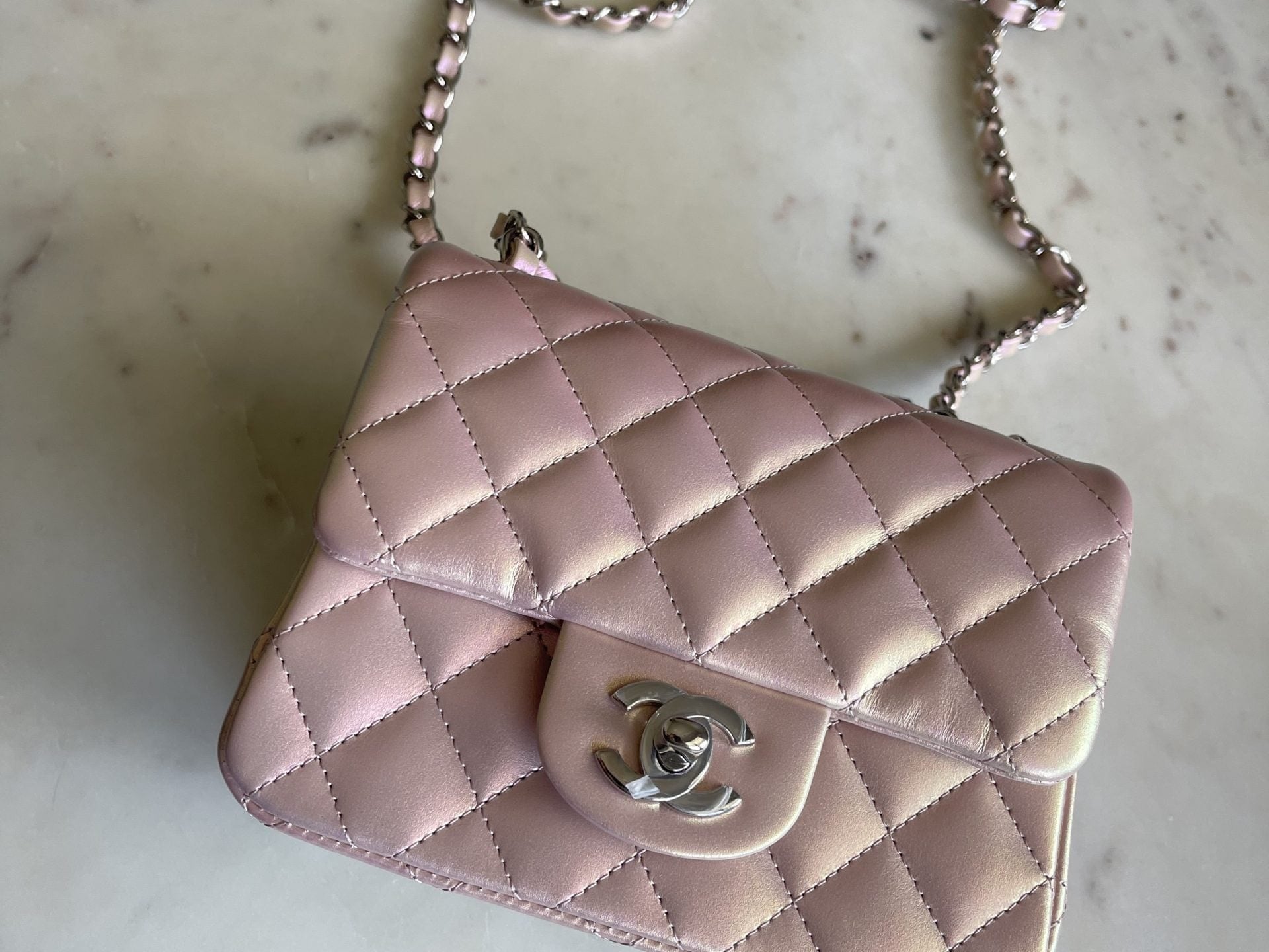 CHANEL Handbag 21K Mini Pink Iridescent Square Lambskin Quilted Classic Flap SHW - Redeluxe