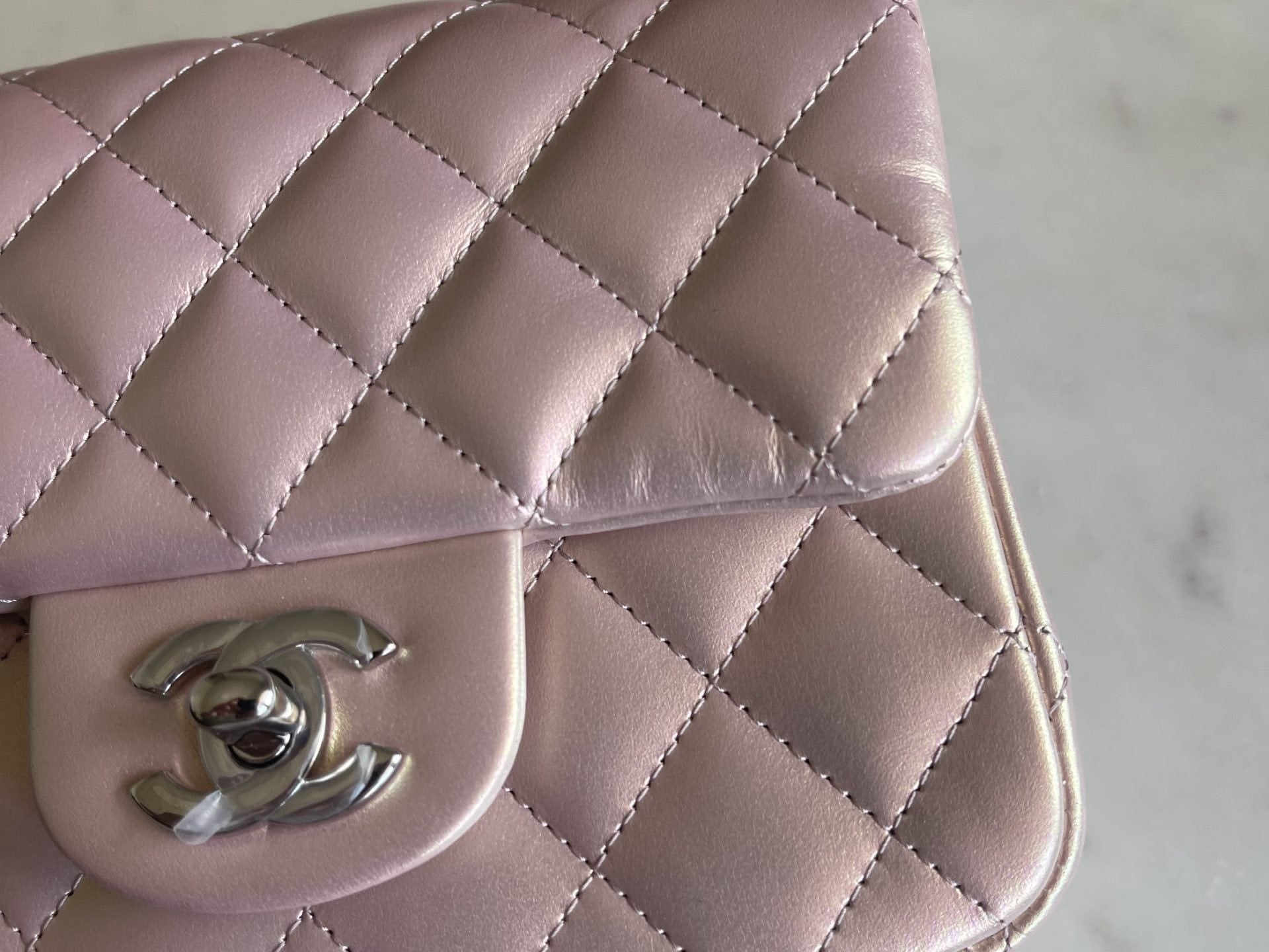 CHANEL Handbag 21K Mini Pink Iridescent Square Lambskin Quilted Classic Flap SHW - Redeluxe