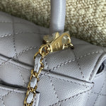 CHANEL Handbag 21K Quilted Coco Handle Lilac Caviar Small LGHW - Redeluxe