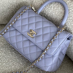 CHANEL Handbag 21K Quilted Coco Handle Lilac Caviar Small LGHW - Redeluxe