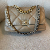 CHANEL Handbag 21S Large Beige/Gold Lambskin Quilted 19 Flap Mixed Hardware - Redeluxe