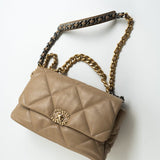 CHANEL Handbag 21S Large Beige/Gold Lambskin Quilted 19 Flap Mixed Hardware - Redeluxe