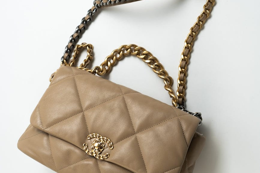 CHANEL Handbag 21S Large Beige/Gold Lambskin Quilted 19 Flap Mixed Hardware - Redeluxe