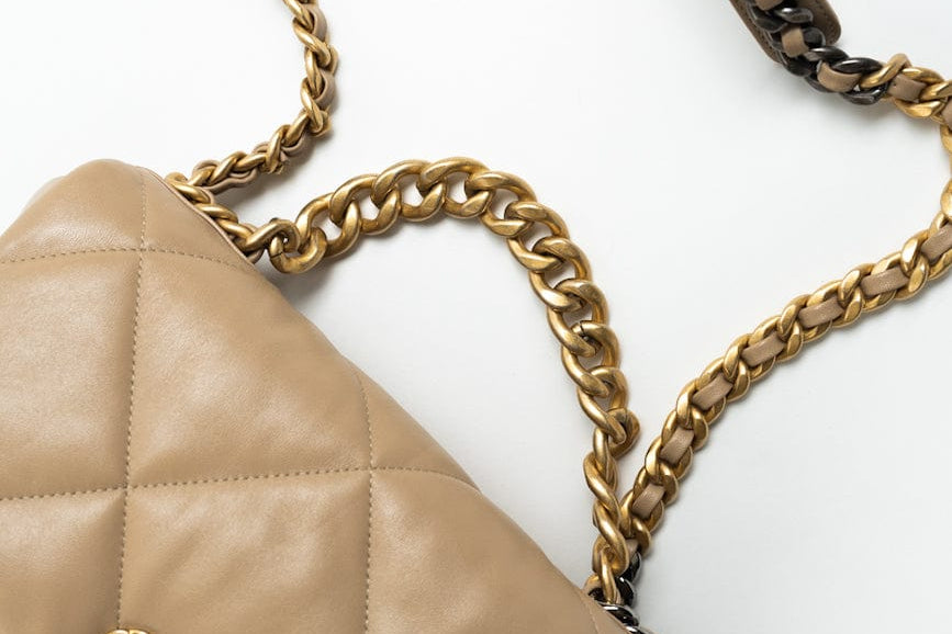 CHANEL Handbag 21S Large Beige/Gold Lambskin Quilted 19 Flap Mixed Hardware - Redeluxe