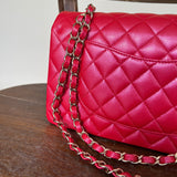 Chanel Handbag 21S Red Iridescent Caviar Quilted Classic Flap Medium - Redeluxe