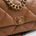 CHANEL Handbag 22A Caramel / Light Brown Lambskin Quilted 19 Flap Small MHW - Redeluxe