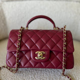 CHANEL Handbag 22A Mini Burgundy Lambskin Quilted Single Flap with Top handle Light Gold Hardware - Redeluxe
