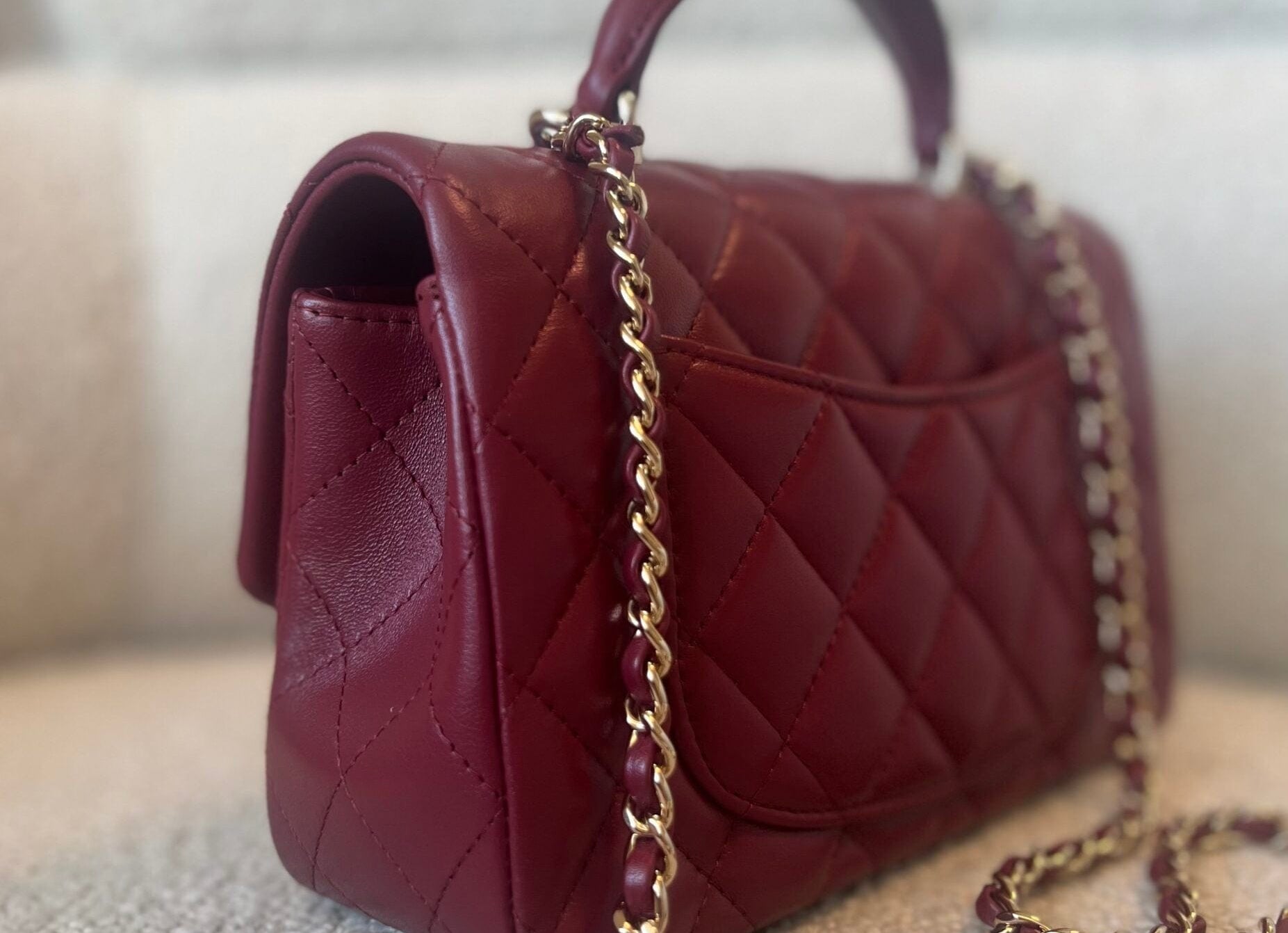 CHANEL Handbag 22A Mini Burgundy Lambskin Quilted Single Flap with Top handle Light Gold Hardware - Redeluxe