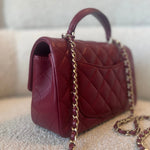 CHANEL Handbag 22A Mini Burgundy Lambskin Quilted Single Flap with Top handle Light Gold Hardware - Redeluxe