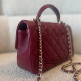 CHANEL Handbag 22A Mini Burgundy Lambskin Quilted Single Flap with Top handle Light Gold Hardware - Redeluxe