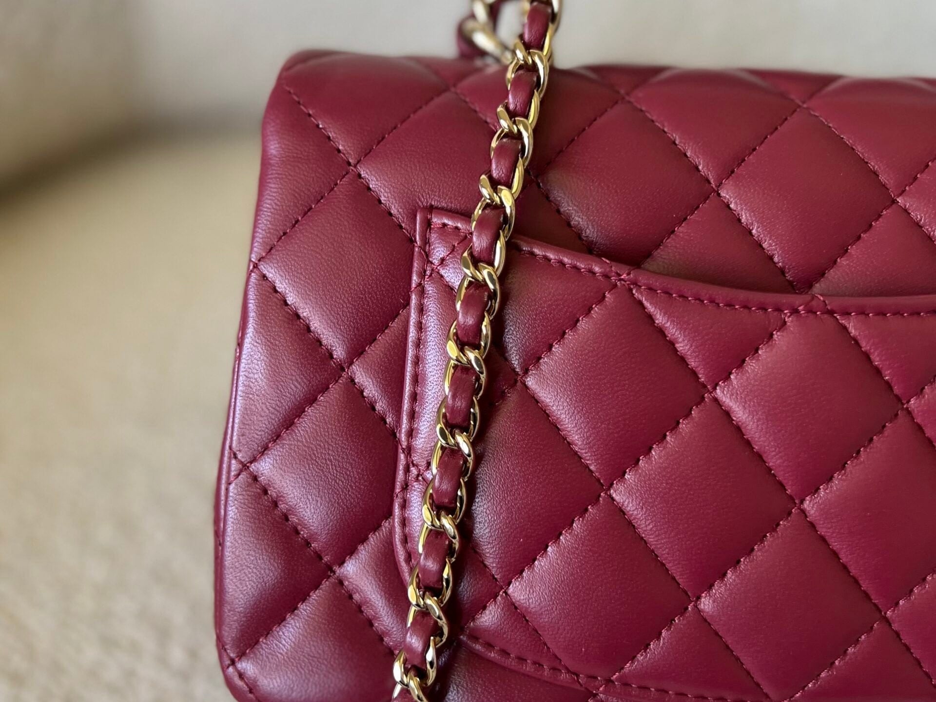 CHANEL Handbag 22A Mini Burgundy Lambskin Quilted Single Flap with Top handle Light Gold Hardware - Redeluxe