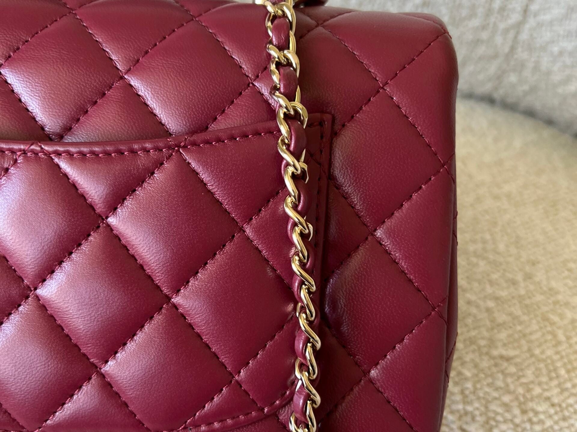 CHANEL Handbag 22A Mini Burgundy Lambskin Quilted Single Flap with Top handle Light Gold Hardware - Redeluxe