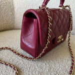 CHANEL Handbag 22A Mini Burgundy Lambskin Quilted Single Flap with Top handle Light Gold Hardware - Redeluxe