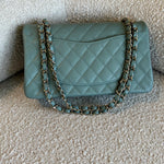 CHANEL Handbag 22C Dark Green Caviar Classic Flap Quilted Medium LGHW - Redeluxe