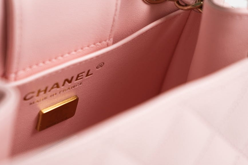 CHANEL Handbag 22S Light Pink Caviar Quilted Mini Bucket Bag LGHW - Redeluxe