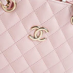 CHANEL Handbag 22S Light Pink Caviar Quilted Mini Bucket Bag LGHW - Redeluxe