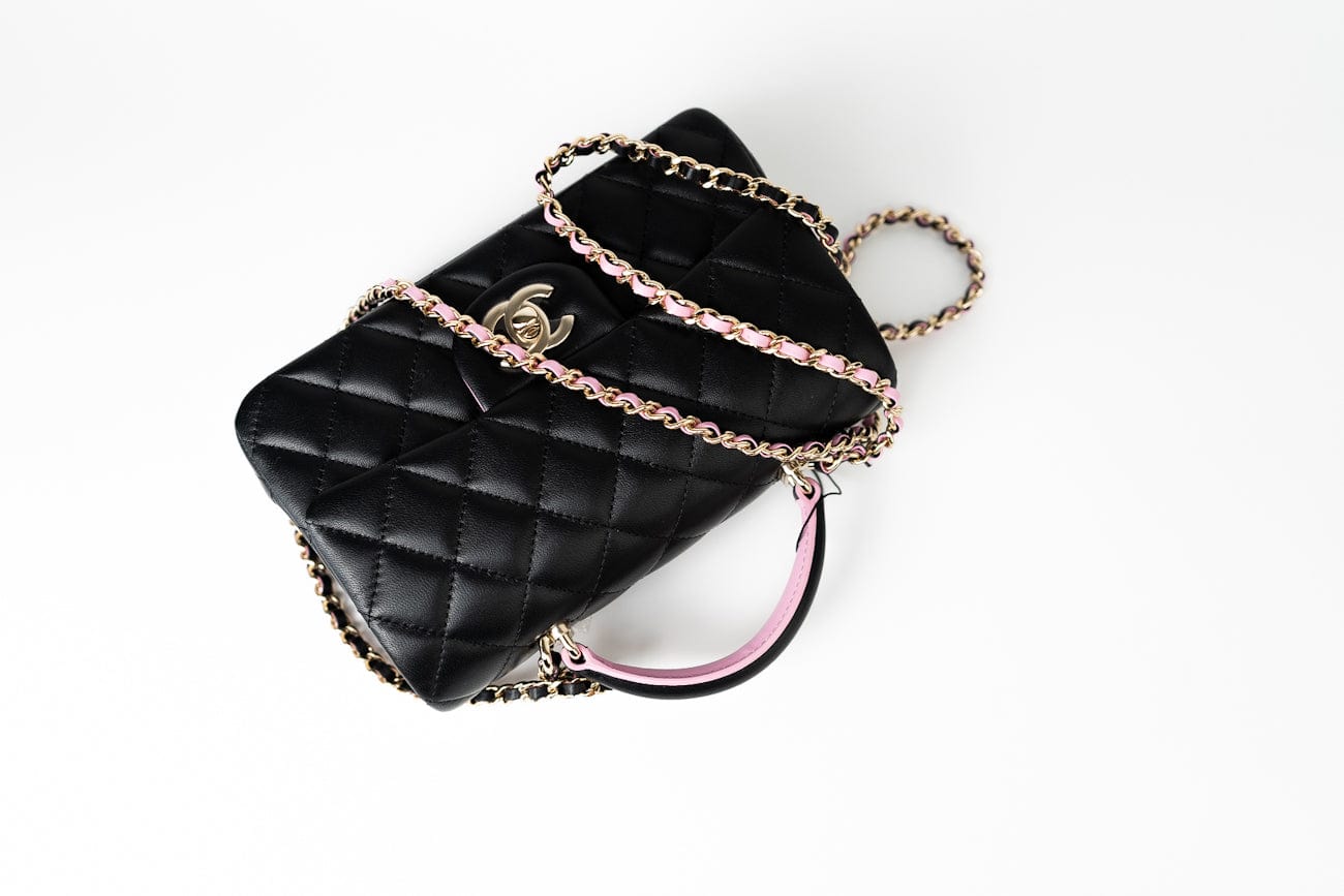 CHANEL Handbag 23P Mini Top Handle Black/Pink Lambskin Quilted w/ Light Gold Hardware - Redeluxe