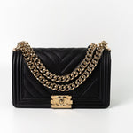 CHANEL Handbag Black 19S Shiny Black Caviar Chevron Boy Bag Medium Champagne Gold Hardware - Redeluxe