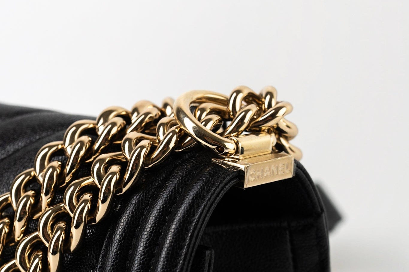 CHANEL Handbag Black 19S Shiny Black Caviar Chevron Boy Bag Medium Champagne Gold Hardware - Redeluxe