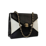 CHANEL Handbag Black Vintage Black and White Lambskin Envelope Shoulder Bag Gold Hardware - Redeluxe