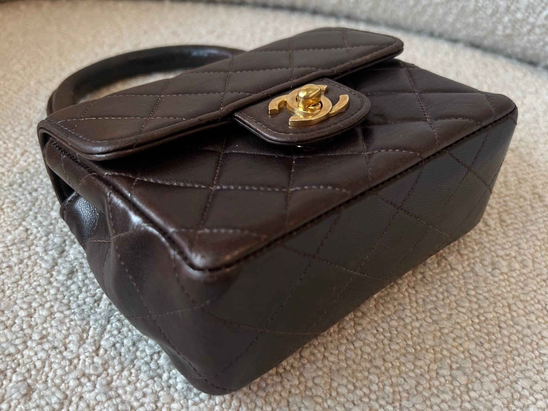 CHANEL Handbag Brown Vintage Brown Lambskin Quilted Micro Mini Kelly with Top Handle GHW - Redeluxe