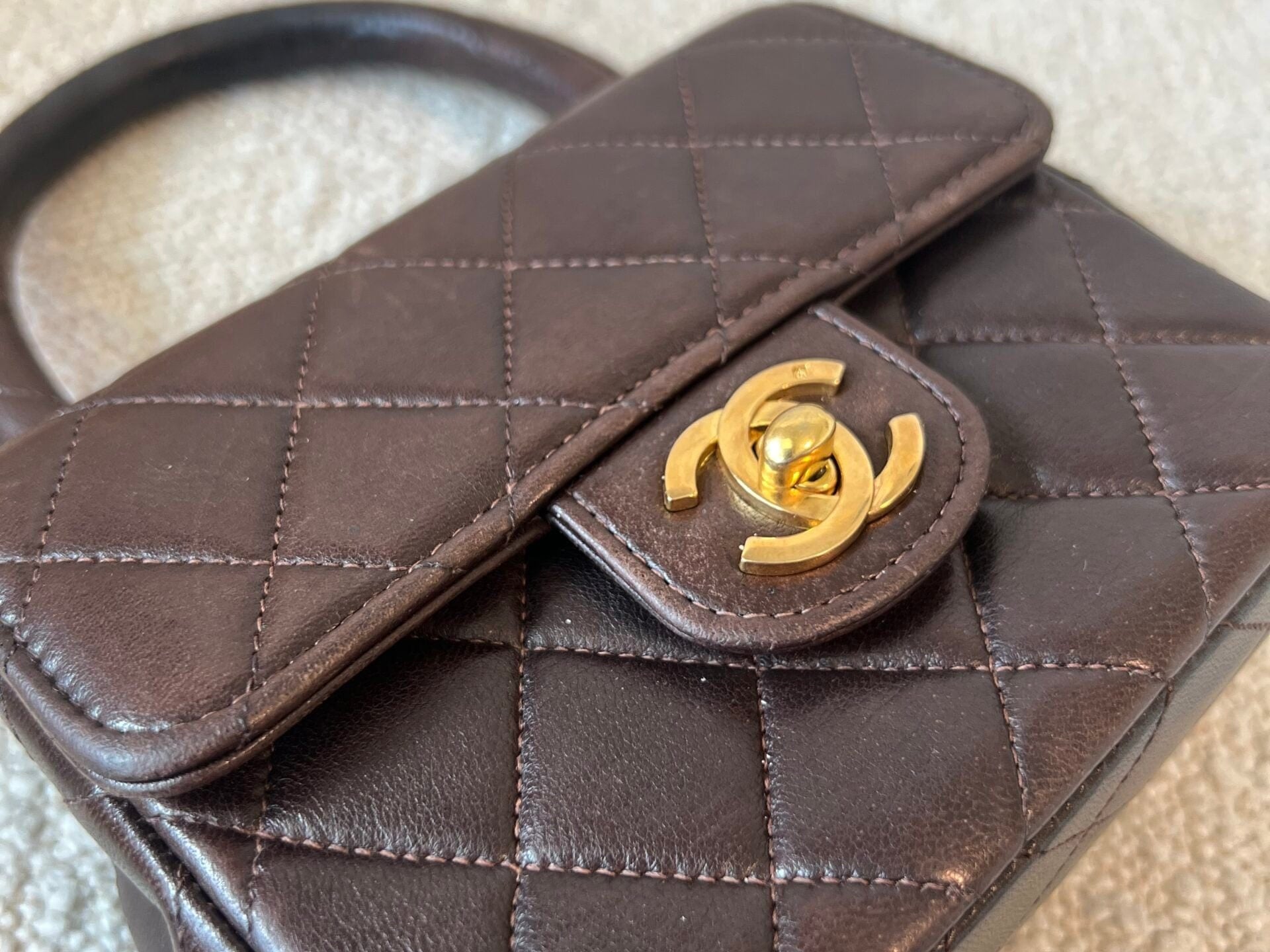 CHANEL Handbag Brown Vintage Brown Lambskin Quilted Micro Mini Kelly with Top Handle GHW - Redeluxe