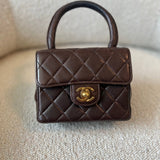 CHANEL Handbag Brown Vintage Brown Lambskin Quilted Micro Mini Kelly with Top Handle GHW - Redeluxe
