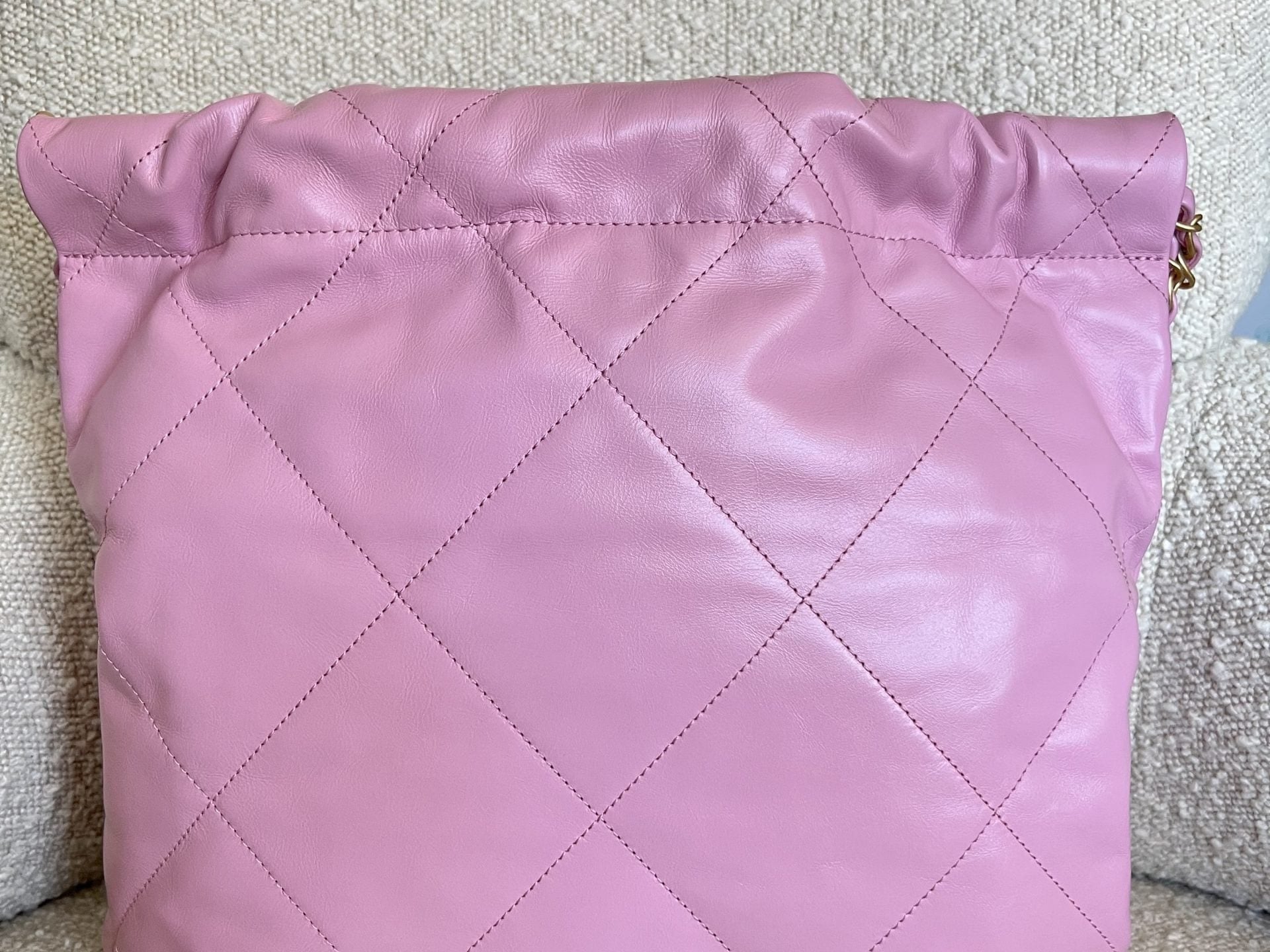CHANEL Handbag Chanel 22 Pink Shiny Calfskin Quilted Drawstring Bag Small GHW - Redeluxe