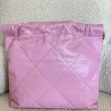 CHANEL Handbag Chanel 22 Pink Shiny Calfskin Quilted Drawstring Bag Small GHW - Redeluxe