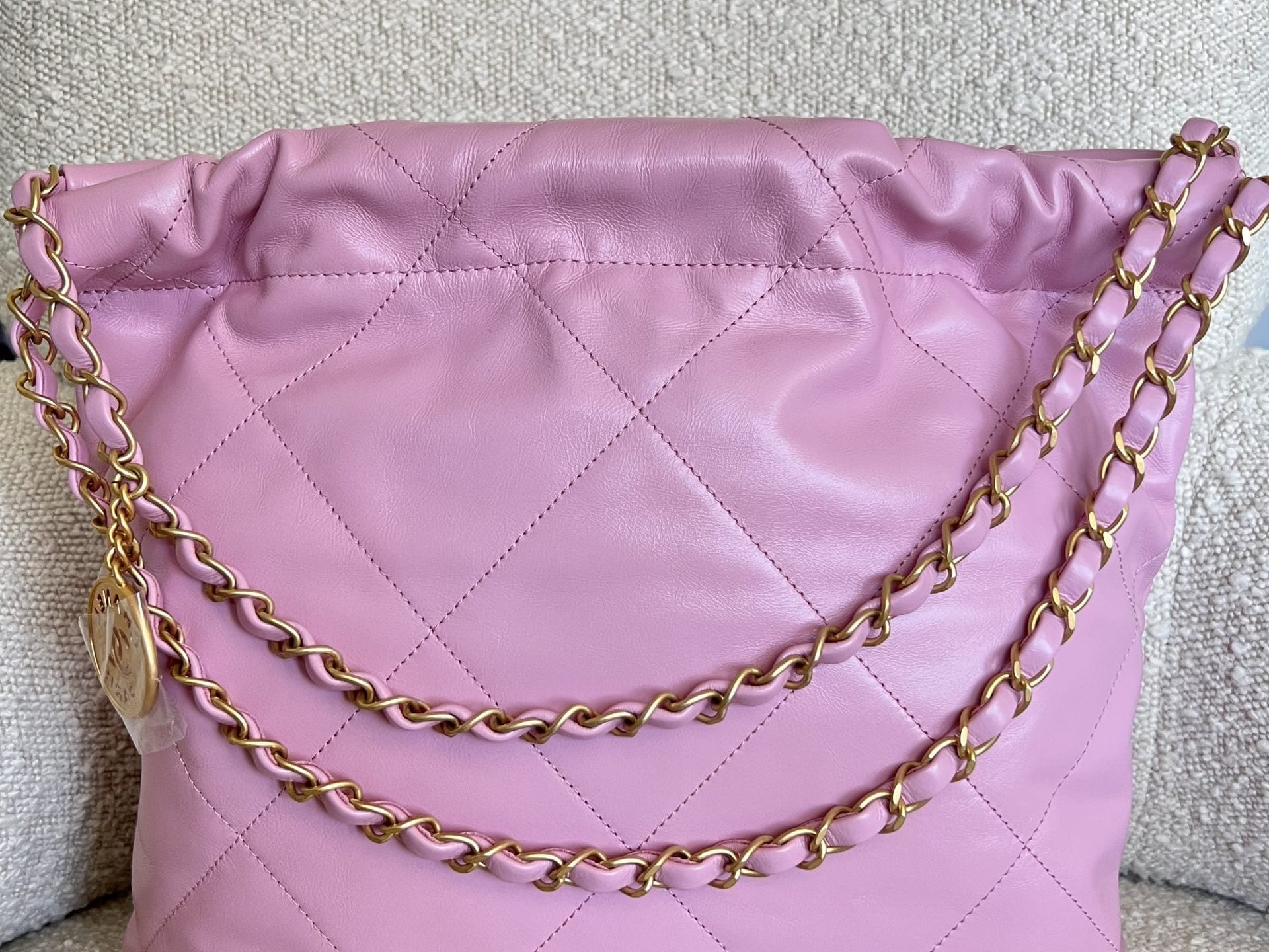 CHANEL Handbag Chanel 22 Pink Shiny Calfskin Quilted Drawstring Bag Small GHW - Redeluxe