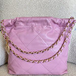 CHANEL Handbag Chanel 22 Pink Shiny Calfskin Quilted Drawstring Bag Small GHW - Redeluxe