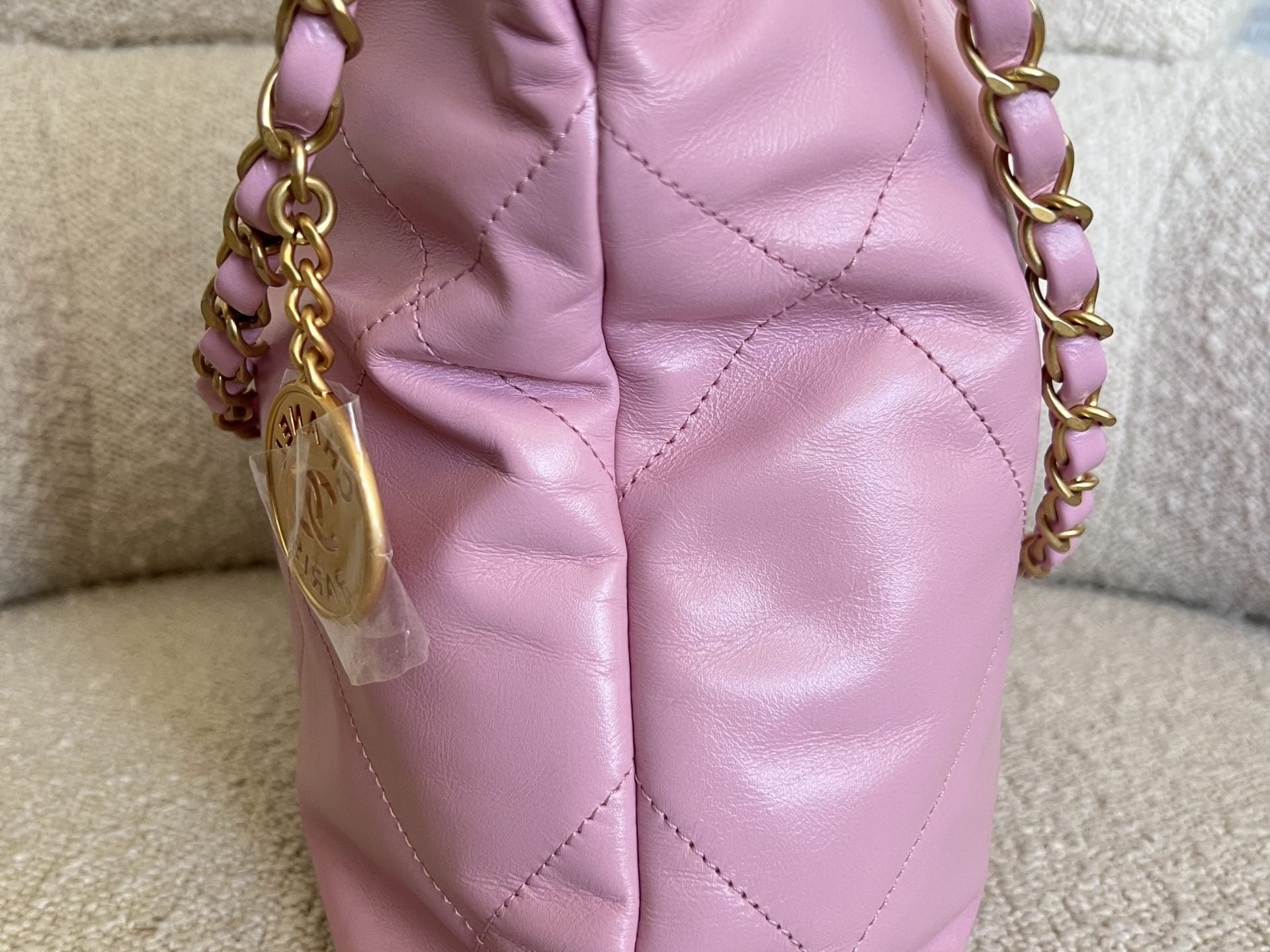 CHANEL Handbag Chanel 22 Pink Shiny Calfskin Quilted Drawstring Bag Small GHW - Redeluxe