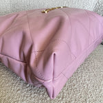 CHANEL Handbag Chanel 22 Pink Shiny Calfskin Quilted Drawstring Bag Small GHW - Redeluxe